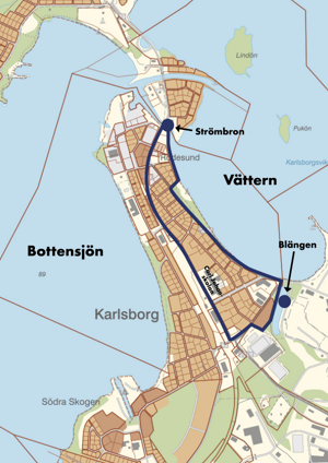 Karta &ouml;ver centrala Karlsborg som visar ber&ouml;rt omr&aring;de: Omr&aring;det mellan Storgatan och Strandv&auml;gen, fr&aring;n Str&ouml;mbron i norr och Bl&auml;ngen i s&ouml;der.  